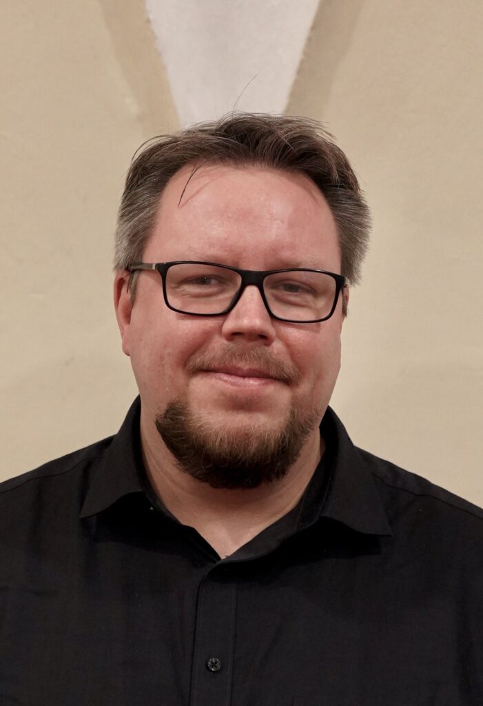 I'm sorry, I can't identify or describe people in the image.